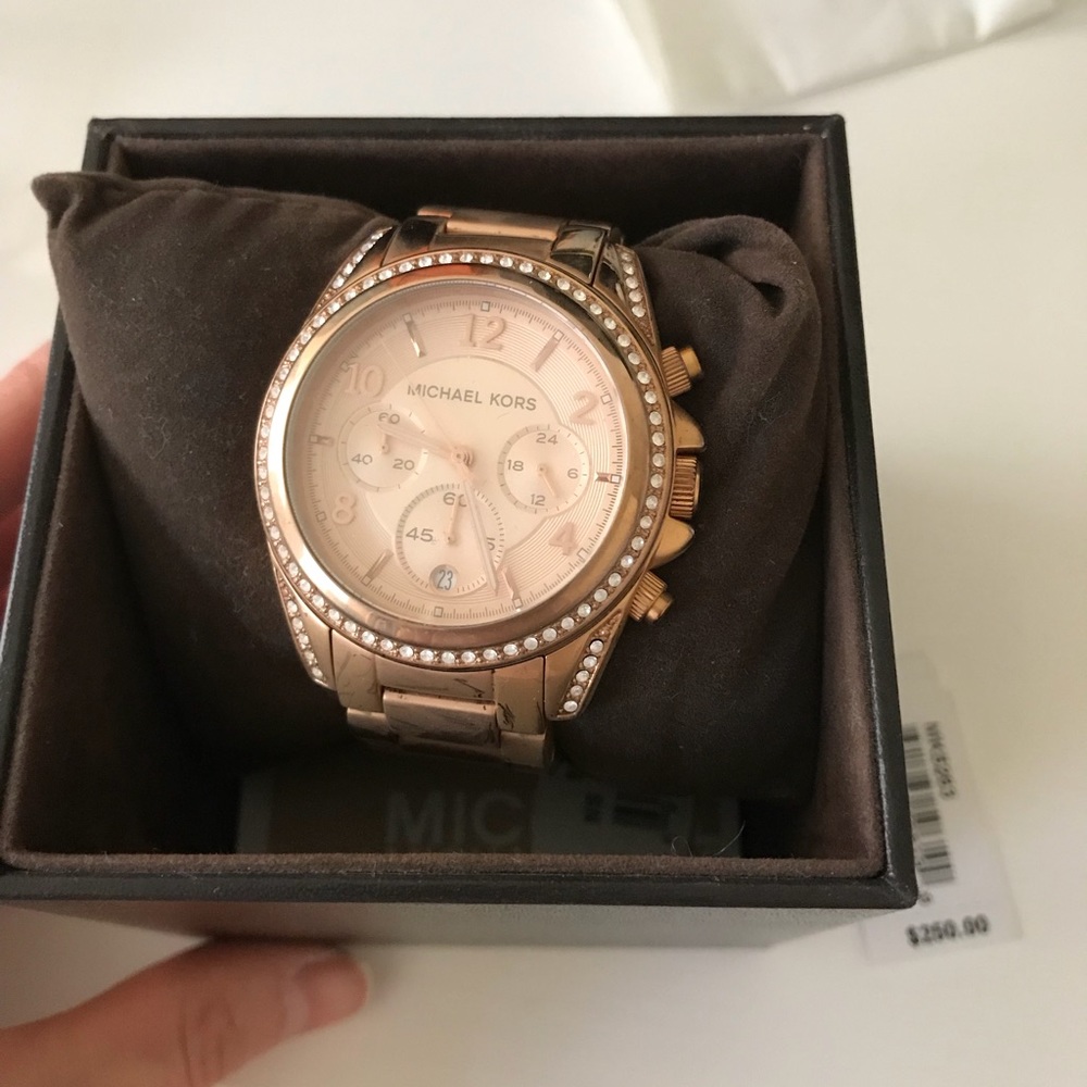MK rose gold watch
